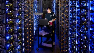 In this undated photo made available by Google, Denise Harwood diagnoses an overheated computer processor at Google’s data center in The Dalles, Ore. Google uses these data centers to store email, photos, video, calendar entries and other information shared by its users. These centers also process the hundreds of millions of searches that Internet users make on Google each day. (AP Photo/Google, Connie Zhou)